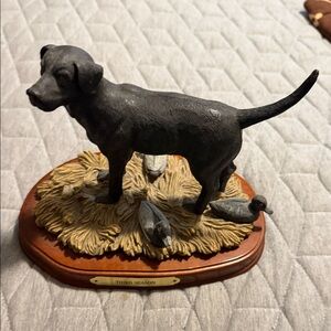 Charming Black Dog Figurine with Ducks